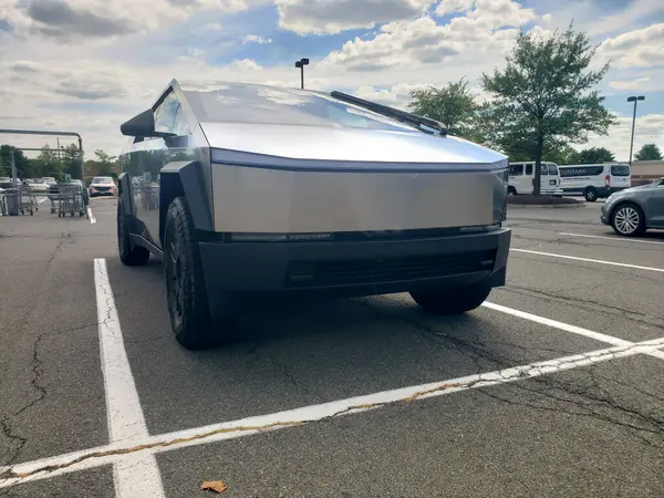 stock image Tesla electric Cybertruck parked in the shopping plaza. Front view.