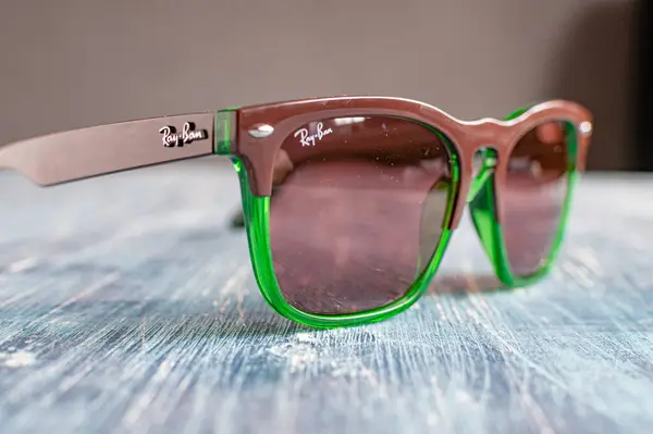 stock image Ray-Ban sunglasses in green plastic frame. Popular and fashionable accessory