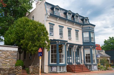 Brick Houses on the streets of old Leesburg, Virginia. Architecture of preserved old buildings in the historic center. clipart