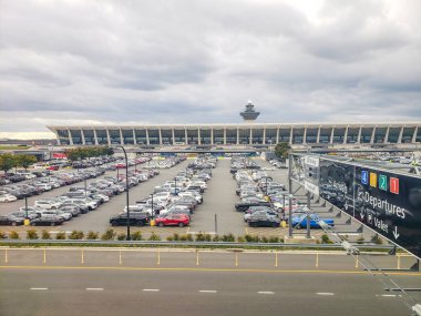 Highway and Large parking lot for cars at the airport near Washington D.C. clipart