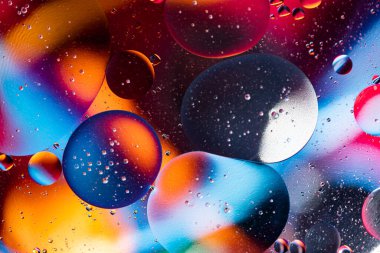 Kozmik deniz deseni, boya lekeleri. Soyut girdap boyama efekti.