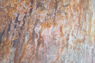 Turuncu, eski, paslı beton levha. Tasarım için arkaplan.