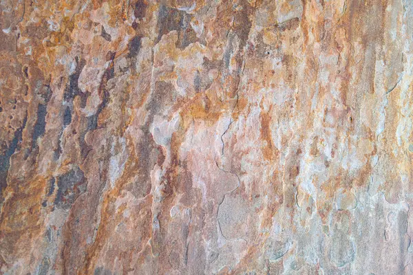 Turuncu, eski, paslı beton levha. Tasarım için arkaplan.