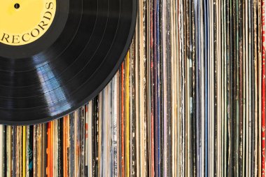 collection of vintage vinyl records in a stack. Top view. Place for text. clipart