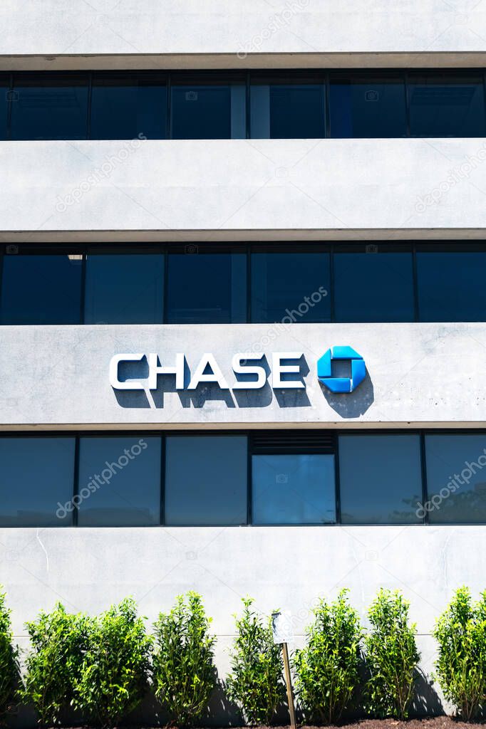 Chase Bank logo on the wall of the building. Tysons, Virginia.