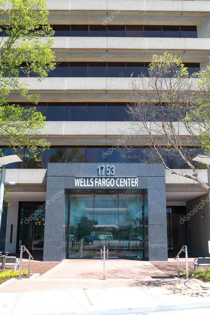 Main entrance to the Wells Bank Branch with lettering above the entrance in Tysons, Virginia.