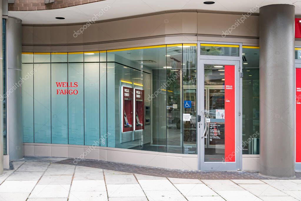 Glass display case with ATMs at Wells Fargo Bank in downtown Washington DC.