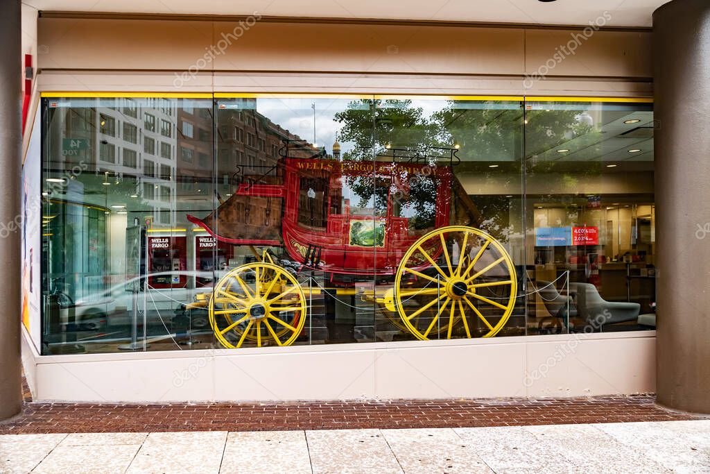 Glass display case with an antique carriage house at Wells Fargo Bank in downtown Washington DC.