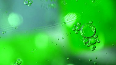 Baloncuklu soyut sıvı renkli renkler. Makro atış. Dairesel hareket.