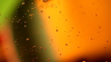 Baloncuklu soyut sıvı renkli renkler. Makro atış. Dairesel hareket.