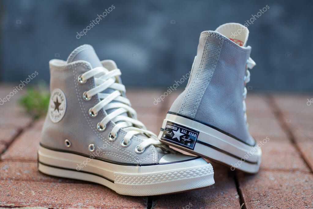 Street Style Simplicity. Neutral canvas shoes captured in natural light.