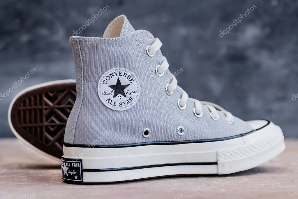 Comfort Meets Fashion. Classic lace-up sneakers Converse with minimalist aesthetic.
