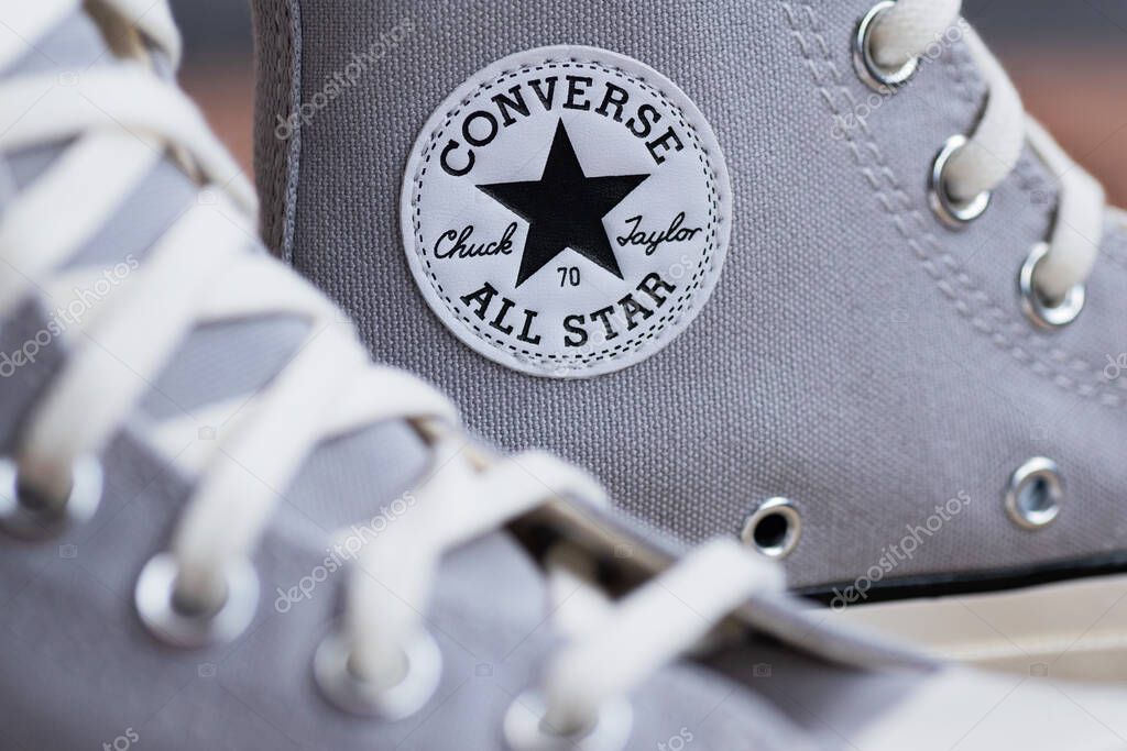 Trendy Street Style Shoes Converse. Neutral-toned canvas sneakers in natural light.