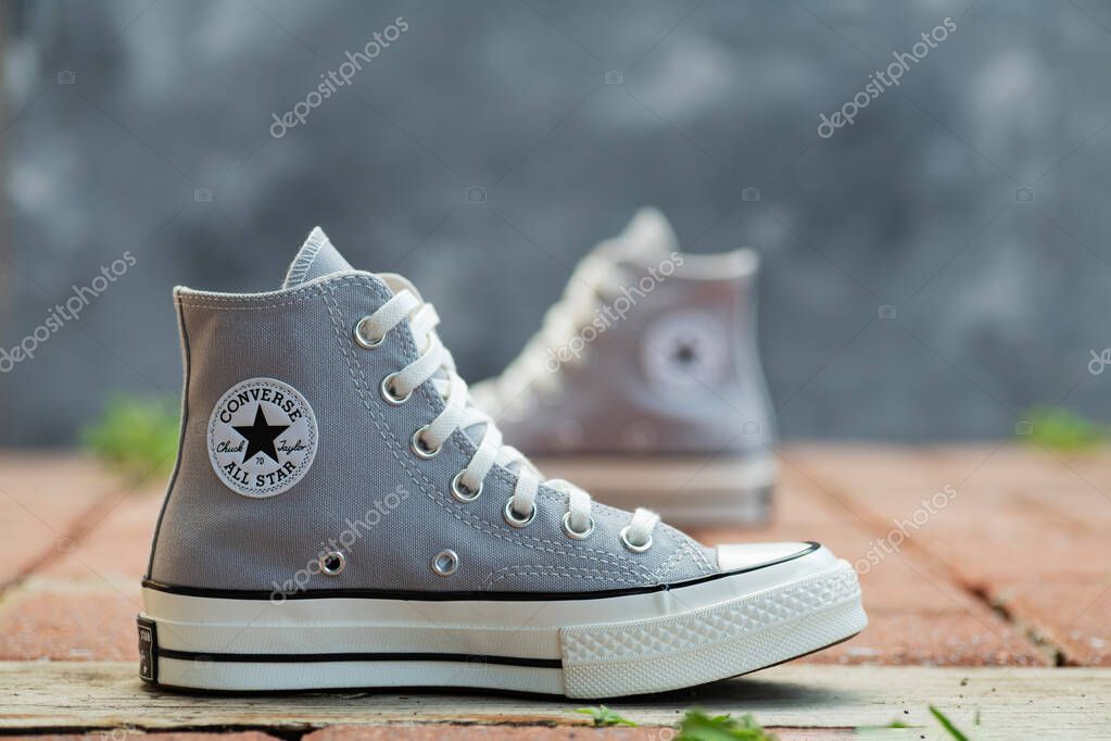 Trendy Street Style Shoes Converse. Neutral-toned canvas sneakers in natural light.