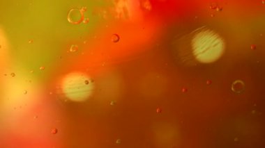 Baloncuklu soyut sıvı renkli renkler. Makro atış. Dairesel hareket.