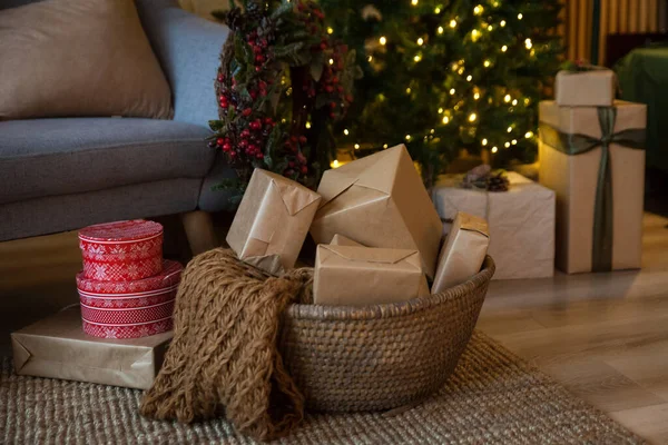 Warm New Year's and Christmas interior. Basket with holiday presents