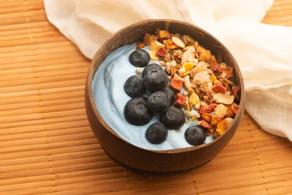 stock image Healthy breakfast concept with flakes, blue spirulina and fresh berries