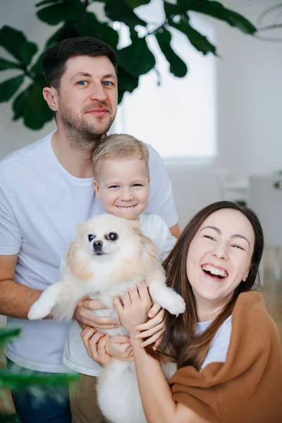 Portrait Happy Young Family Little Son Holding Pomeranian Spitz — Stock Photo, Image