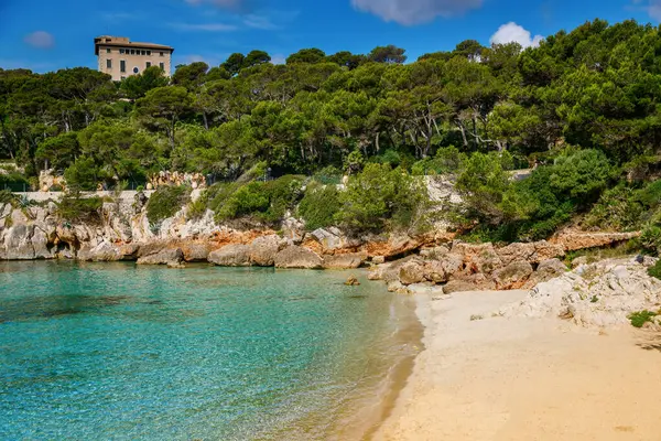 stock image Beautiful sandy beach Cala Gat with clear blue waters and natural surroundings, Mallorca, Spain