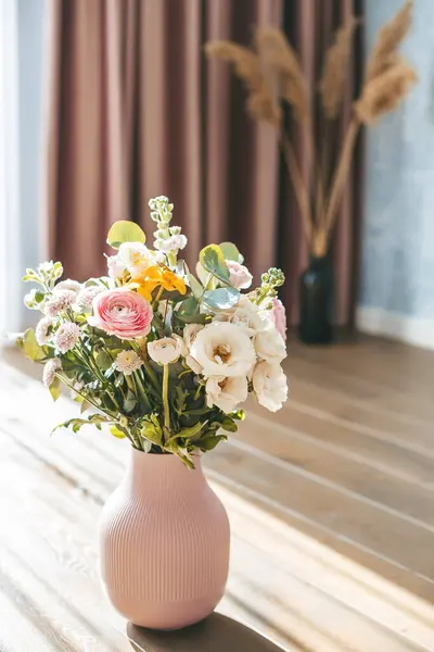 Vibrant Bouquet Assorted Flowers Textured Pink Vase Placed Wooden Floor ストック写真