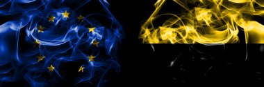 Flags of EU, European Union vs Germany, Saxony Anhalt. Smoke flag placed side by side on black background. 