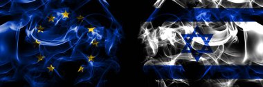 Flags of EU, European Union vs Israel, Israeli. Smoke flag placed side by side on black background. 