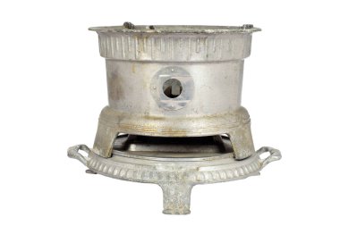 This vintage metal stove features a round, sturdy design with ornate legs and venting mechanisms, reflecting cooking traditions of the past. Ideal for nostalgic kitchens or collectors clipart