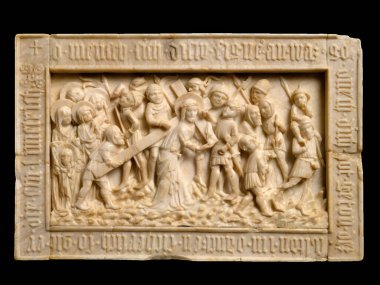 Lorsch Calvary 'nin Efendisi' ne atfedilen ve İsa 'nın haçı Meryem' le birlikte taşıdığı ve bir dizi figürle resmedildiği The Road to Calvary 'nin fildişi kabartma heykeli..