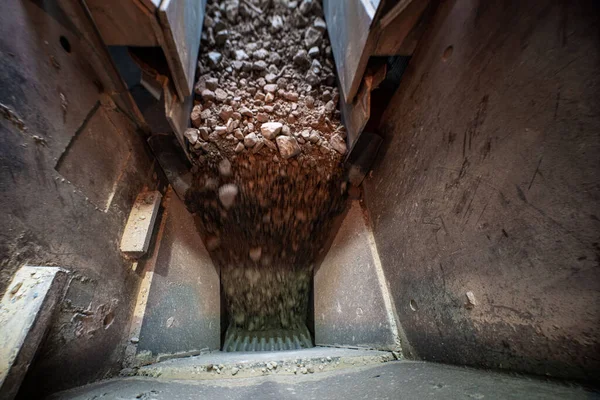 stock image Soil falls from conveyor of crushing and sorting complex. High quality photo