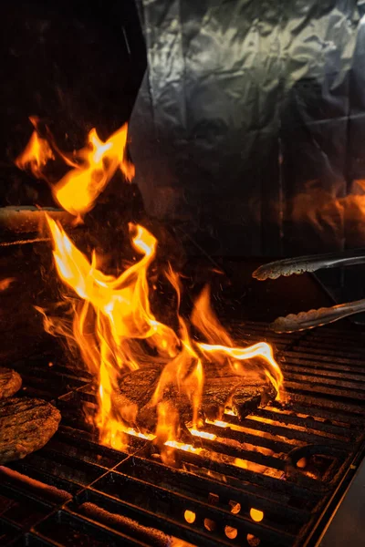 Beef steak on the grill with flames. High quality photo