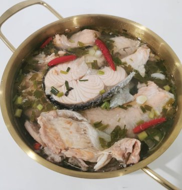 Tom yam salmon in golden plate