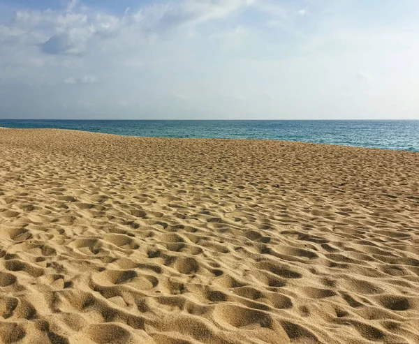砂と青の海の背景 ストックフォト