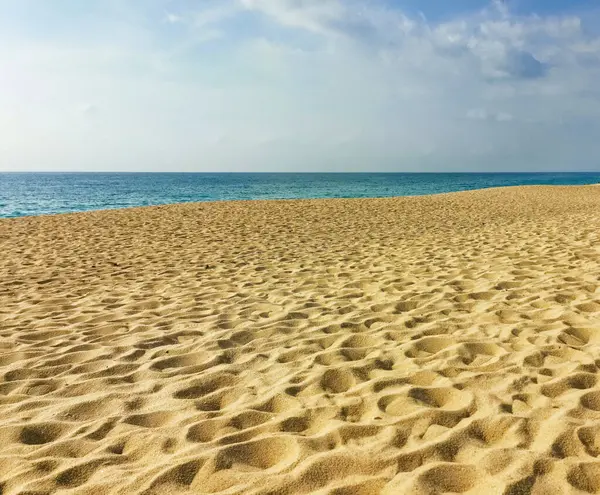 Άμμος Και Γαλάζια Θάλασσα Φόντο Φωτογραφία Αρχείου