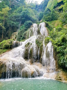 Erawan waterfall in Thai National park. Seven level clipart