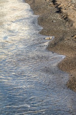 Landscape seashore, sea pier in clear weather.