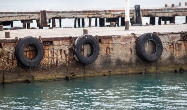 Landscape seashore, sea pier in clear weather.