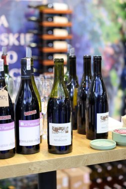 Cracow, Poland - November 17, 2022: International Wine Trade Fair ENOEXPO in Cracow. Producers of wine from all around the world meet the importers distributors and representatives.  clipart