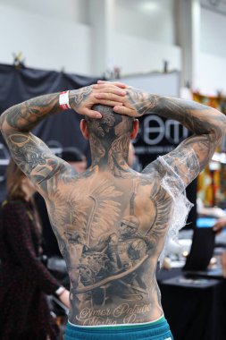 Krakow, Poland -  June 11, 2022: Unidentified  participant at 15th Tattoofest Convention in Cracow. One of the most prestigious tattoo festivals. 