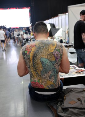 Krakow, Poland -  June 12, 2022: Unidentified  participant at 15th Tattoofest Convention in Cracow. One of the most prestigious tattoo festivals. 
