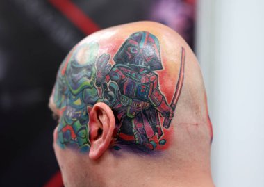 Krakow, Poland -  June 12, 2022: Unidentified  participant at 15th Tattoofest Convention in Cracow. One of the most prestigious tattoo festivals. 