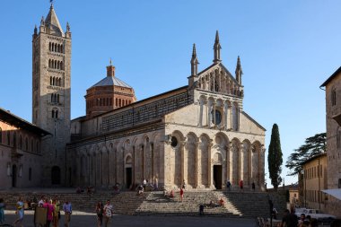 Massa Marittima, Italy - Sept 11, 2022:  the Cathedral of Saint Cerbonius with Bell tower at the Garibaldi square in Massa Marittima. Italy