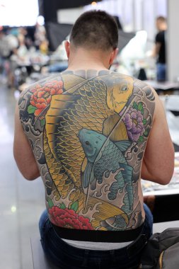 Krakow, Poland -  June 12, 2022: Unidentified  participant at 15th Tattoofest Convention in Cracow. One of the most prestigious tattoo festivals. 