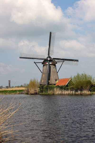 One of the 19 windmills at Kinderdijk in the Netherlands. Built about 1740, this is the largest concentration of windmills in the Netherlands, a UNESCO world heritage site. 