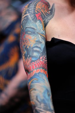 Krakow, Poland -  June 12, 2022: Unidentified  participant at 15th Tattoofest Convention in Cracow. One of the most prestigious tattoo festivals. 