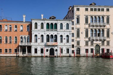 Venice; Italy - September 6; 2022: The Palazzo Grimani Marcello and The Palazzo Querini Dubois on the Grand Canal; in the sestiere of San Polo of Venice; Italy. clipart