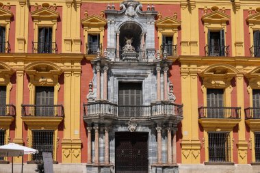 Malaga, Spain - September 10, 2023: Bishop palace (Palace Episcopal) at the Plaza of the Bishop in Malaga, Spain clipart