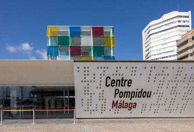 Malaga, Spain - September 10, 2023: Multicolored glass cube in contemporary art museum Pompidou Centre in Malaga. Spain, clipart