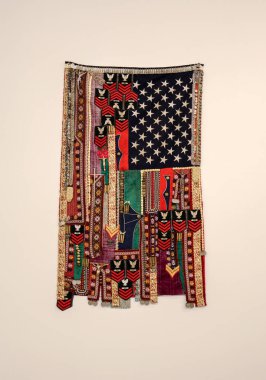 Cracow, Poland - May 8, 2018: Sarra Rahbar - Flags. In the series of flags artist combines American and Iranian motifs. Exibition Motherland in Art at Mocak in Krakow. clipart