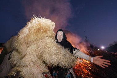 MOHACS, HUNGARY - FEBRUARY 19: Busojaras carnival. Unidentified person wearing mask for spring greetings. February 19, 2023 in Mohacs, Hungary.