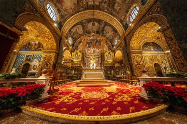 Valletta, Malta - 20 December 2024. Saint John's Co-Cathedral ornated nave. Roman Catholic church in the capital of Malta. Beautiful baroque architecture. clipart